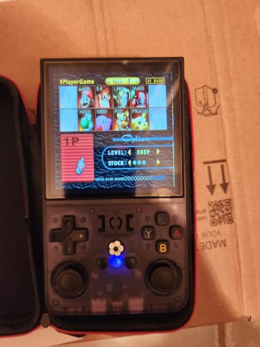 Click to view full screen HN-R36S-Wifi Handheld Retro Game Console - 64GB, 3.5-inch Display with WIFI support photo review